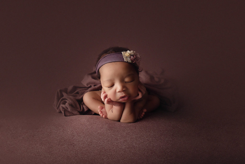 newborn safety finished composite froggy pose baby on purple backdrop