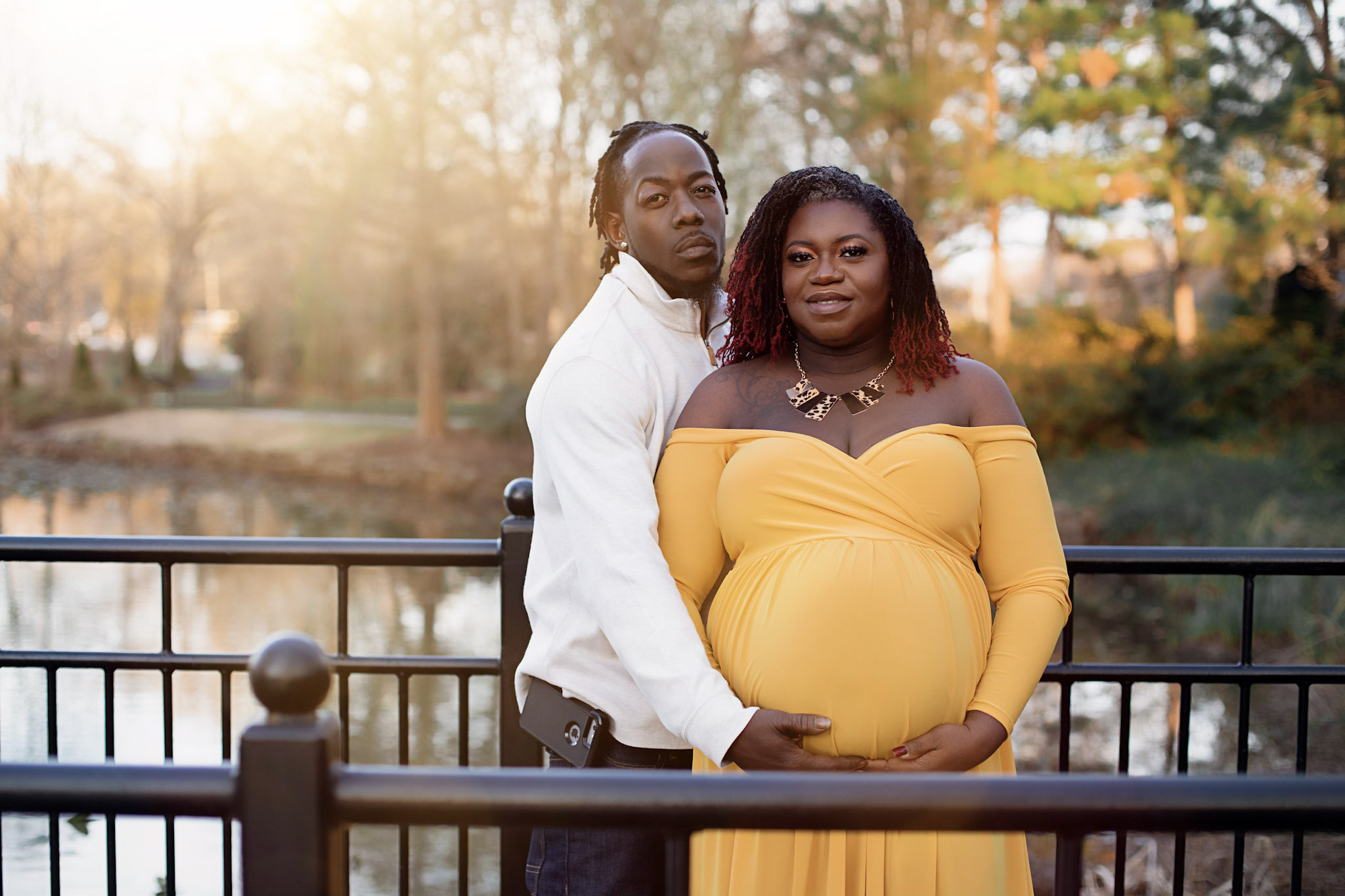 pregnant woman and husband on bridge at glencairn gardens