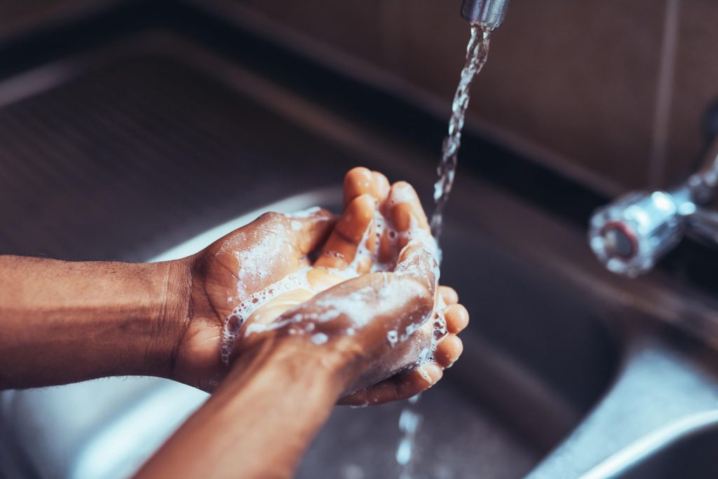 hand washing newborn photography sanitation