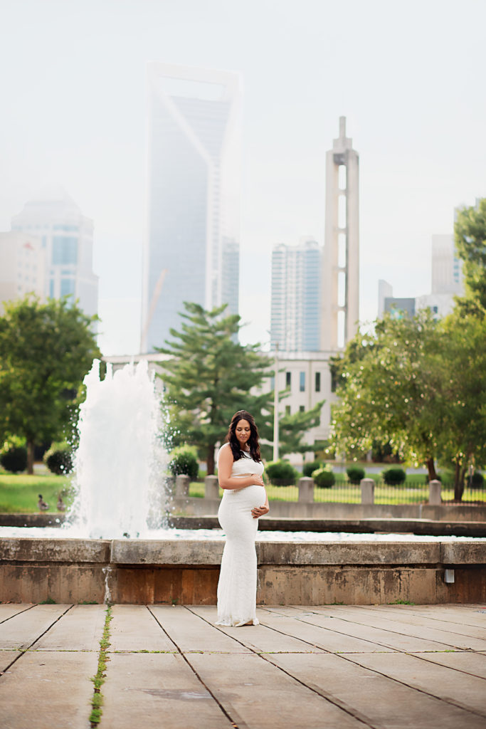 sleeveless white lulus maxi gown what to wear to maternity photos city skyline